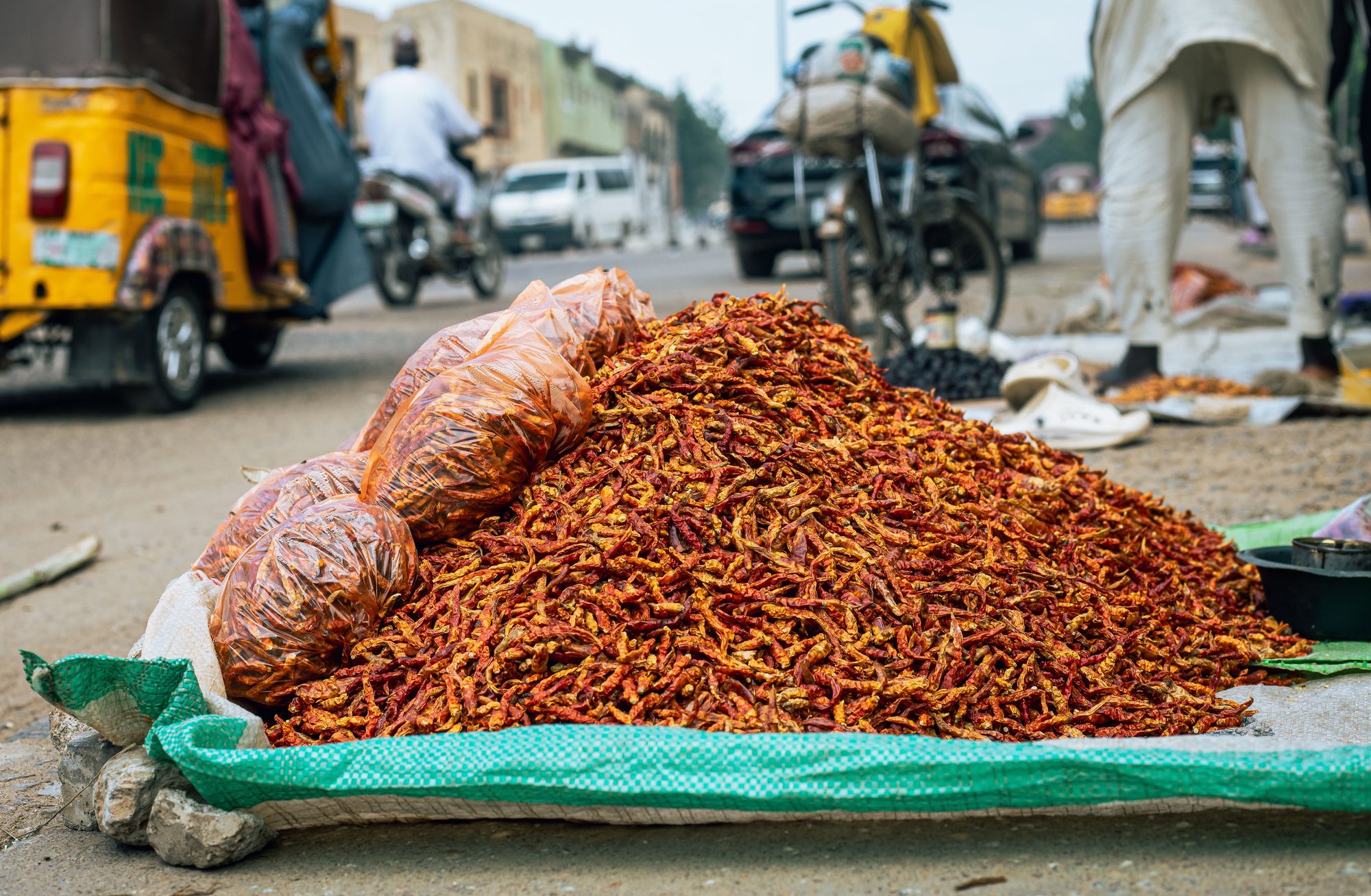 Dried red peppers heaped at a Nigerian street market